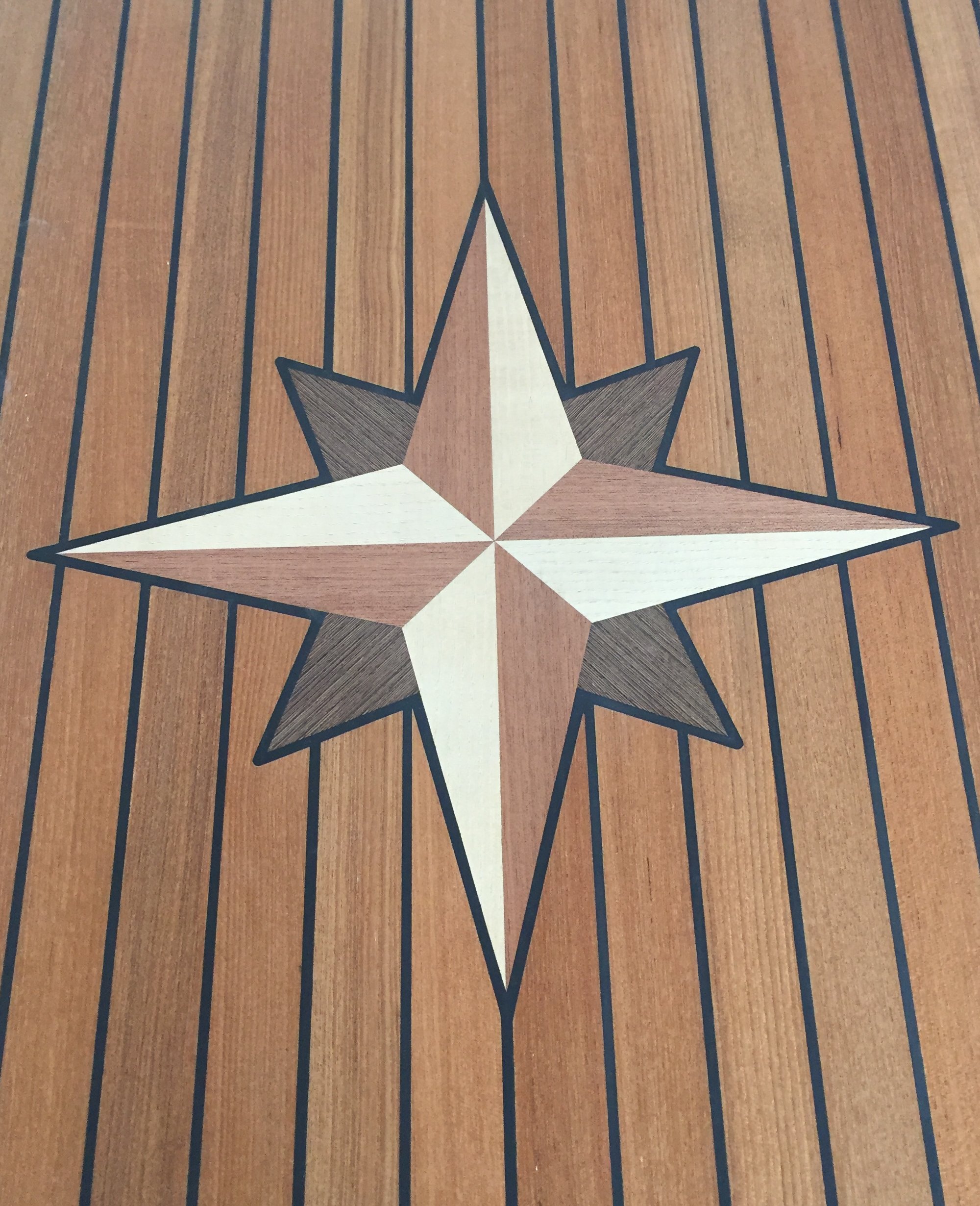 Detail view: Solid wood inlay, compass rose